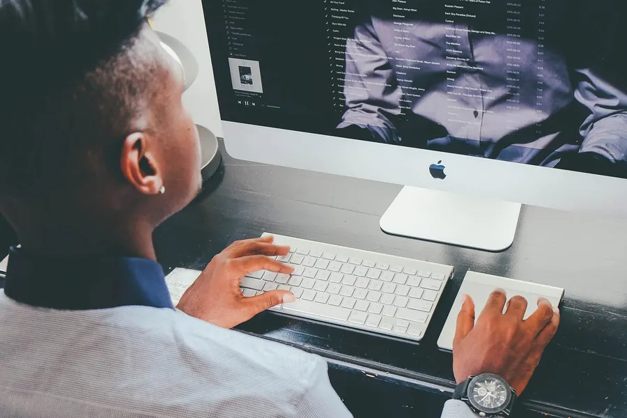 Designer working at a desktop computer