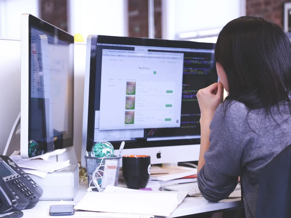 Woman working at a computer in an office